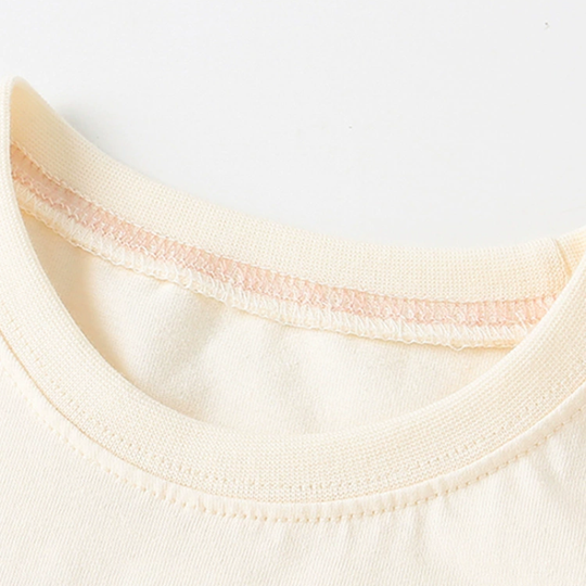 Aina – Regenboog Karakter T-shirt