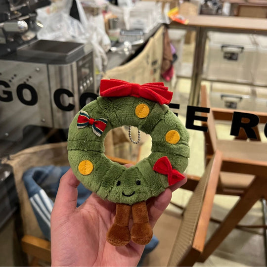 WreathBuddy – Peluche Colgante de Corona de Navidad con Lazo Rojo