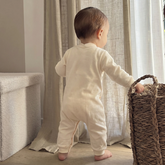 SnuggleSuit – Warme Baby Jumpsuit