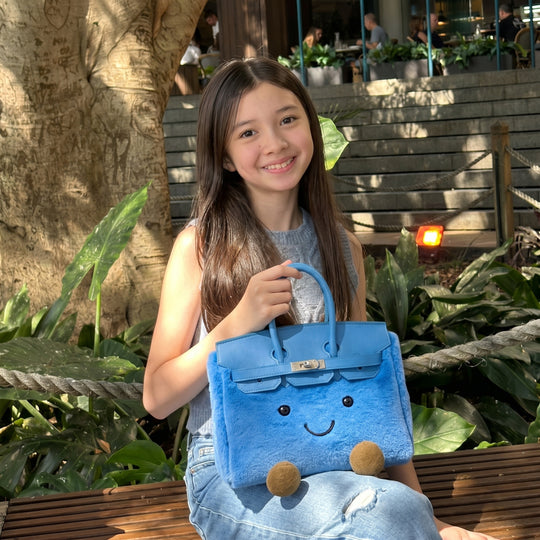 CuddlePurse – Bolsito de Peluche con Carita en Tonos Denim y Pastel