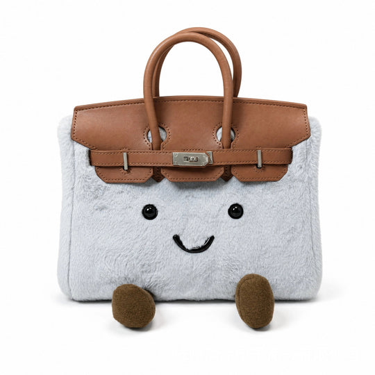 CuddlePurse – Bolsito de Peluche con Carita en Tonos Denim y Pastel