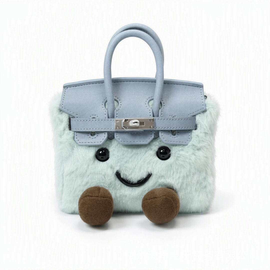 CuddlePurse – Bolsito de Peluche con Carita en Tonos Denim y Pastel