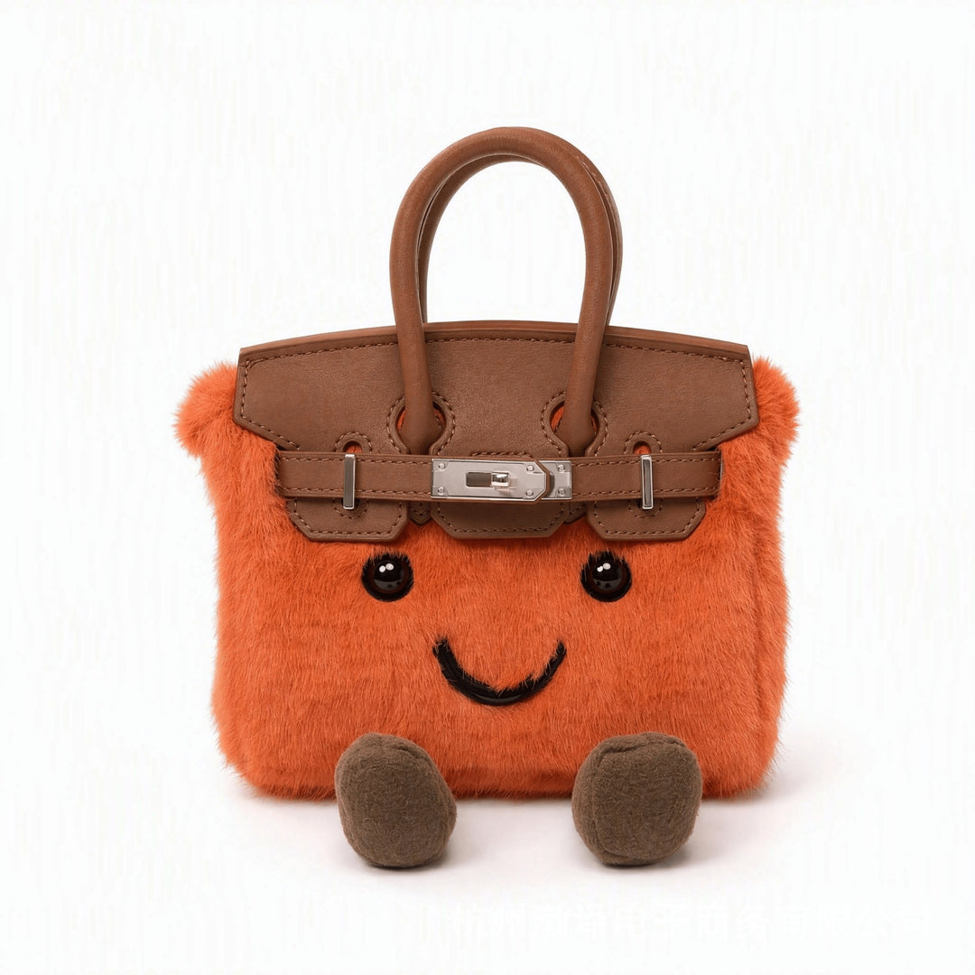 CuddlePurse – Bolsito de Peluche con Carita en Tonos Denim y Pastel