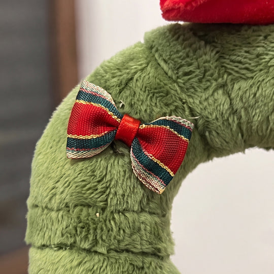 WreathBuddy – Peluche Colgante de Corona de Navidad con Lazo Rojo