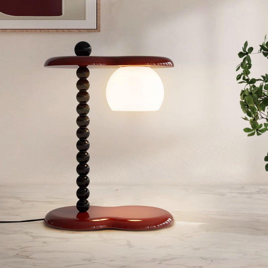 Design tafellamp met ronde voet