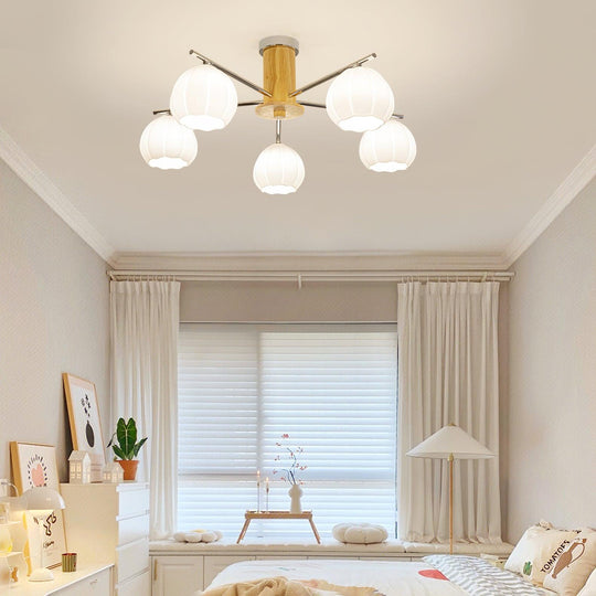 Glazen bloemknop plafondlamp meisjeskamer