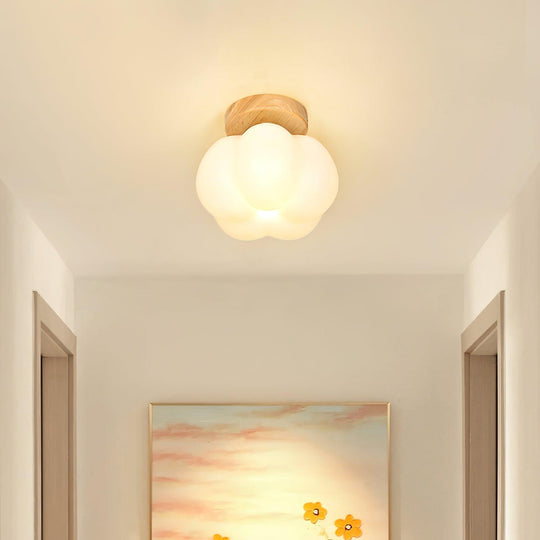 Bloemvormige plafondlamp met houtnerf kap