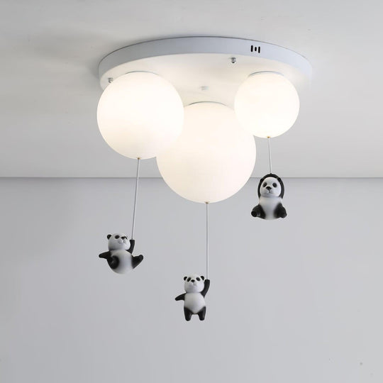 Panda lamp boven kinderbed
