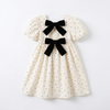 BowBloom – Kinderjurk met Dubbele Strikken en A-lijn Rok studio productfoto - Milo & Moon